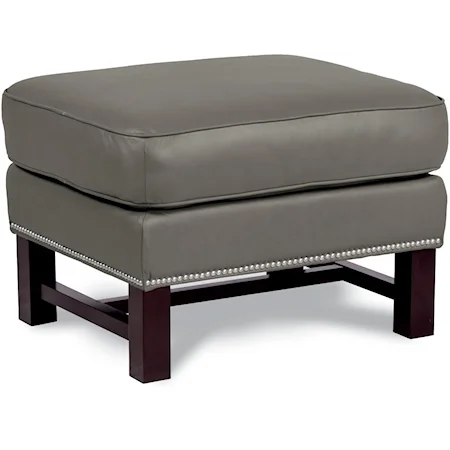 Cosmopolitan Ottoman with Nailheads and Exposed Wood Trim